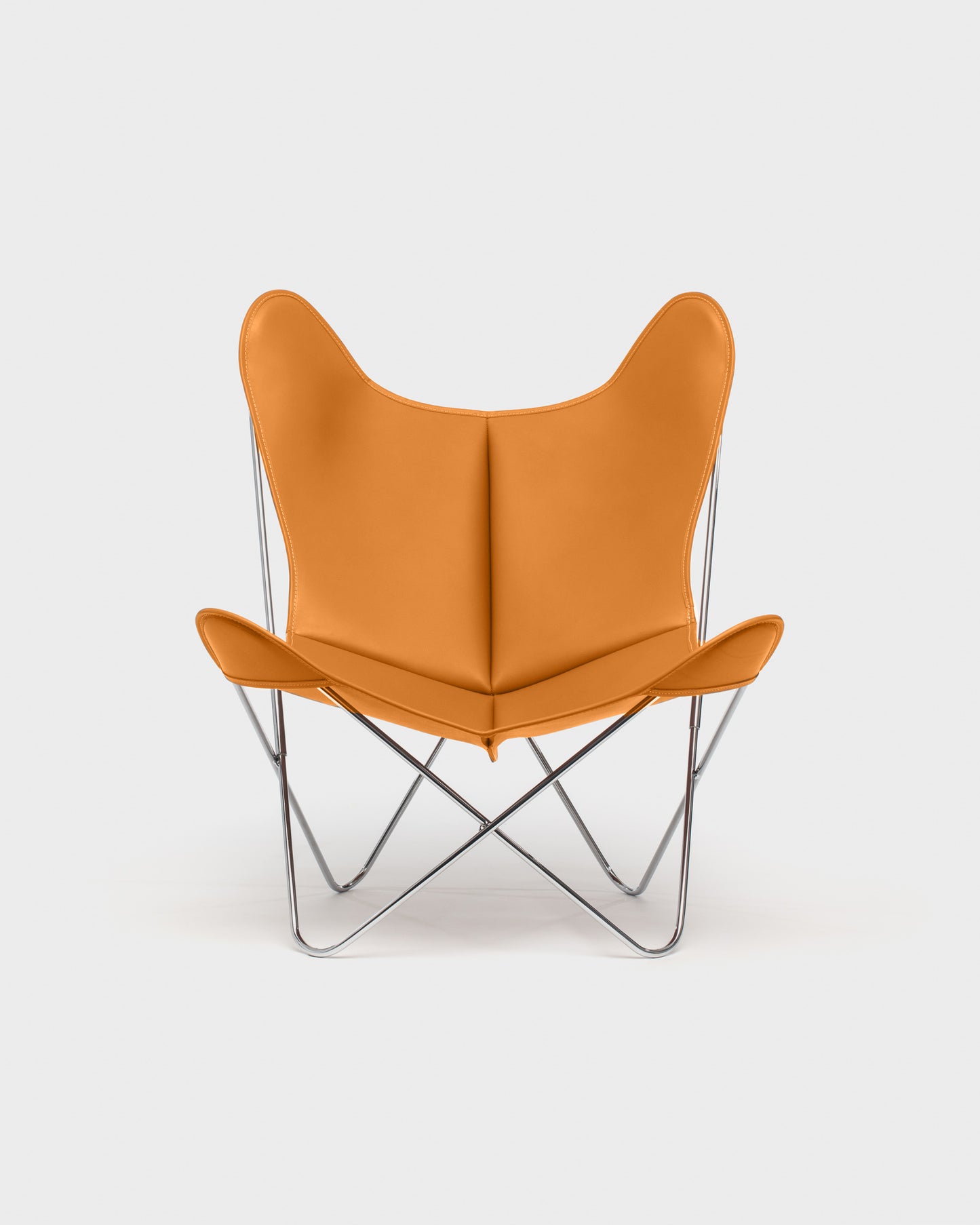 Fauteuil Papillon Cuir miel - Structure inox - Vue de face