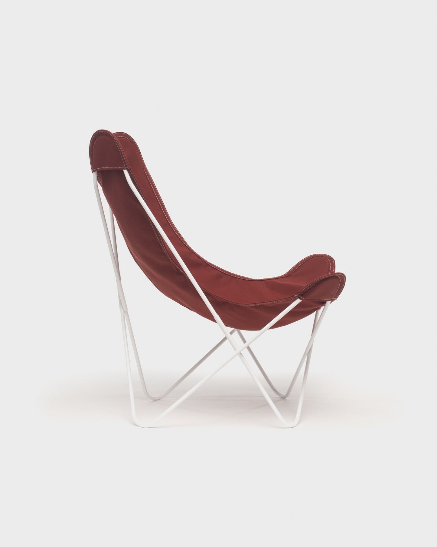 Fauteuil papillon avec une housse en coton 100% de couleur terracotta