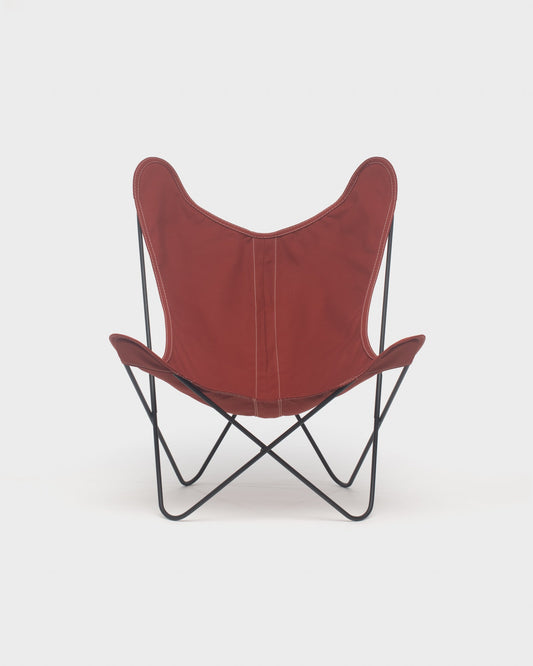 Fauteuil papillon avec une housse en coton 100% de couleur taupe et structure noire