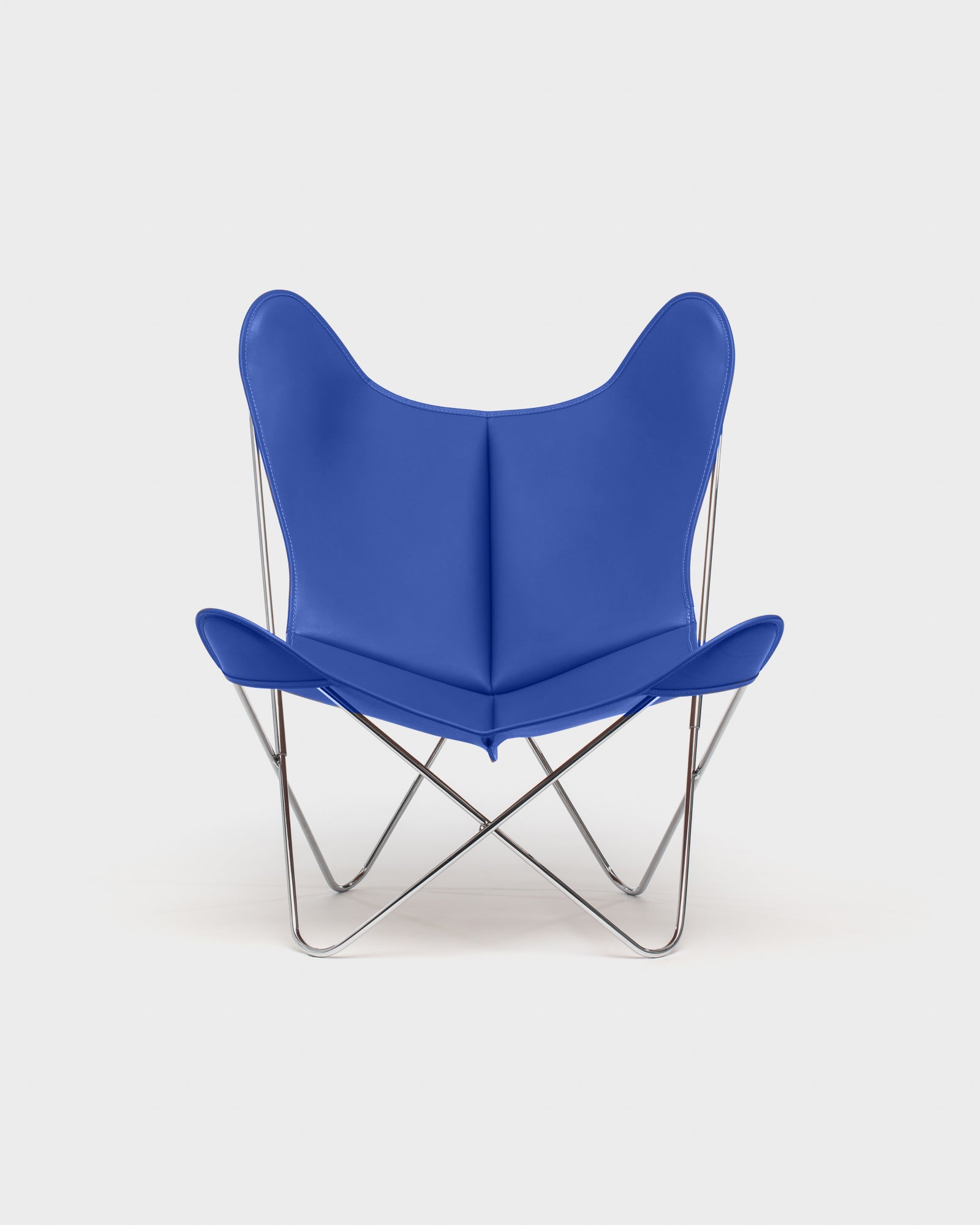 Fauteuil Papillon Cuir bleu - Structure inox - Vue de face