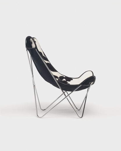 Fauteuil Papillon cuir Vache Noire Blanc Structure inox - Vue de profil