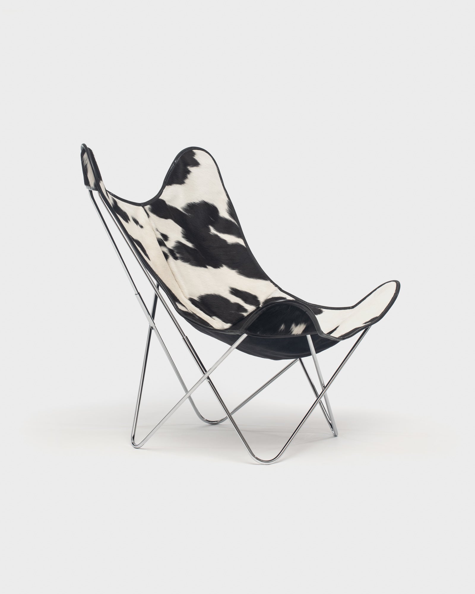 Fauteuil Papillon cuir Vache Noire Blanc Structure inox - Vue 3/4